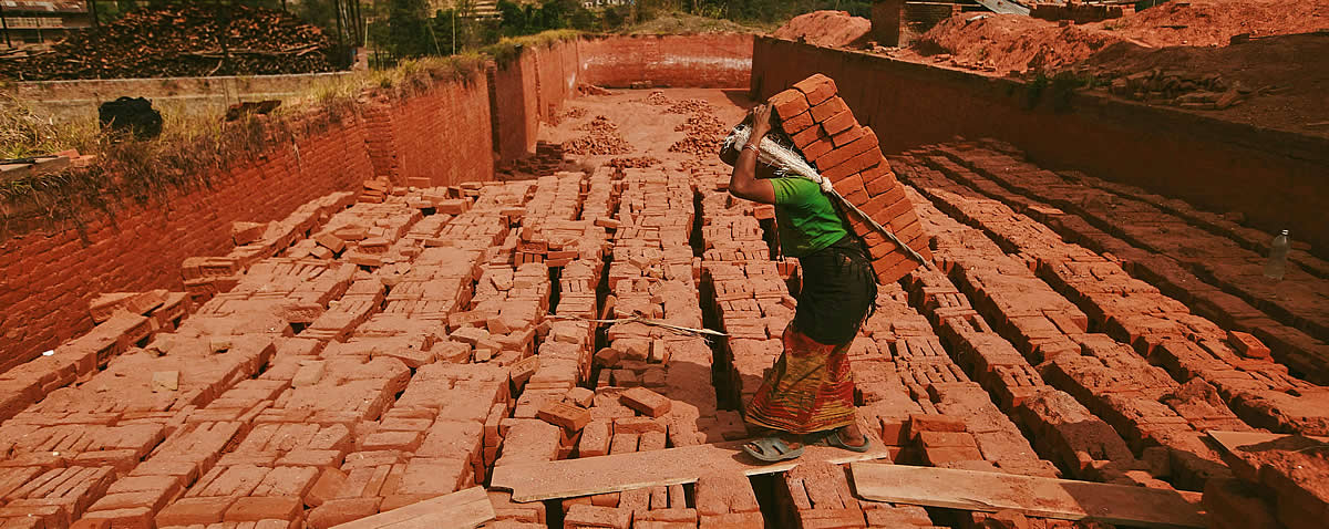 Women's Organizations for Gender Equality and Empowerment, Woman Carrying Bricks on Her Back