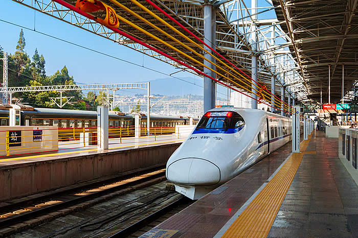 New Silk Road China Belt and Road Initiative (BRI), High-speed bullet train at a city station