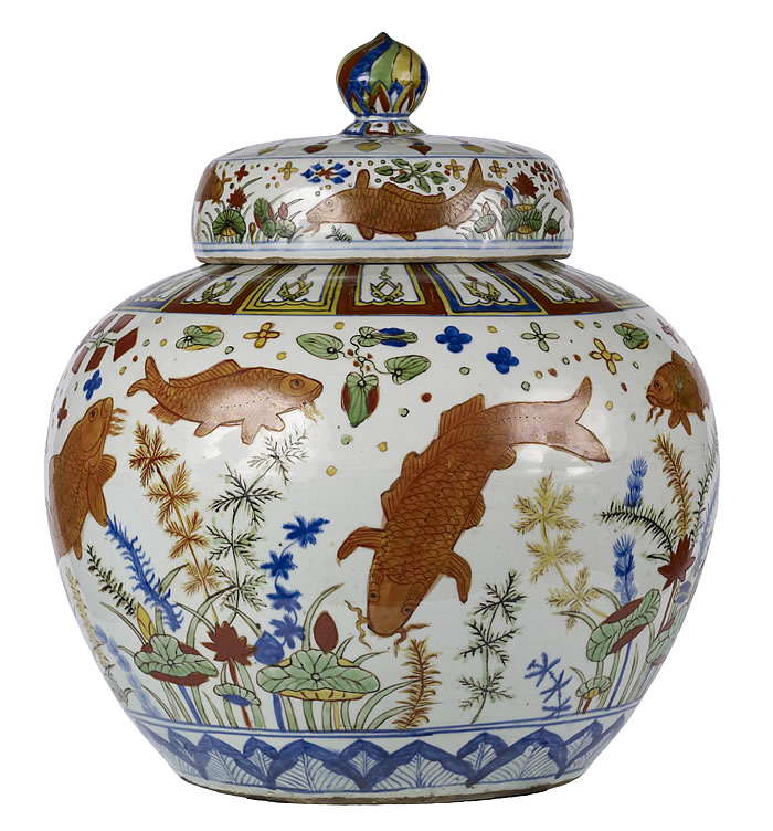 A famous Chinese Wuse (five-color) artwork prominently featuring red, yellow, and blue is the Ming Dynasty Jiajing Wucai Chinese porcelain Fish Jar with Cover, at Red Yellow Blue Silk Road